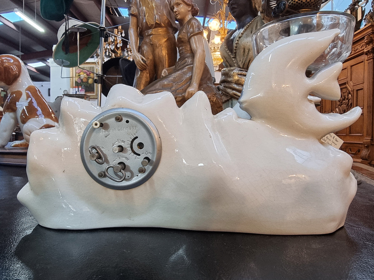 Vintage lustre ceramic fishes with clock. Featuring 2 fish and waves enclosing the clock. Not marked. Clock is ticking no guarantee.