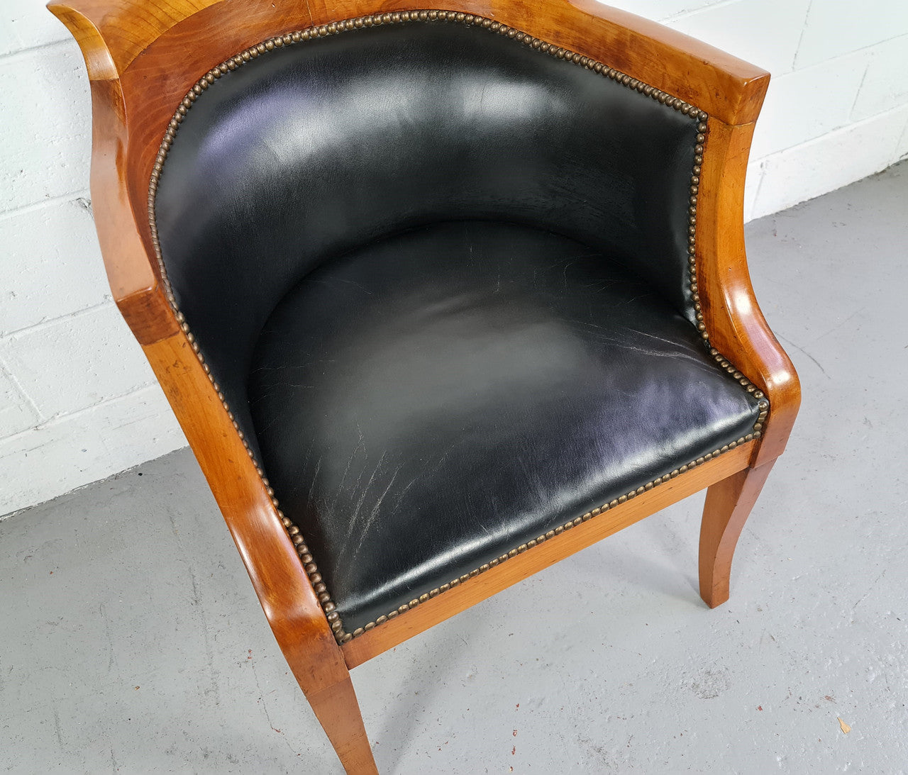 Antique Empire style Walnut and leather office desk chair. In good original detailed condition and leather is in good used condition.