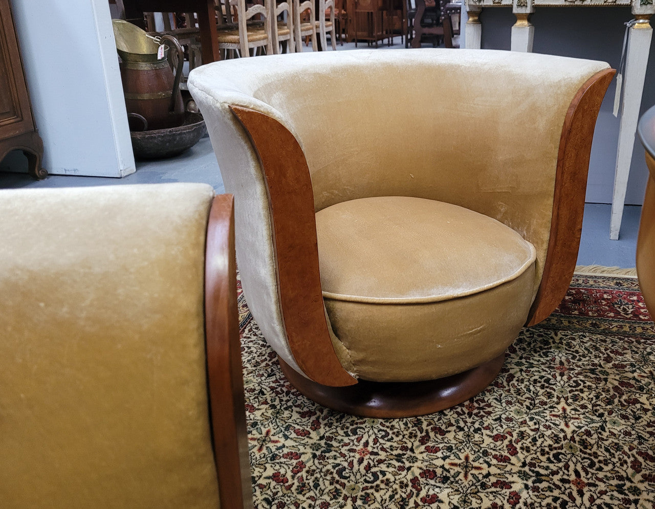 Four stunning original Art Deco Tulip shaped salon lounge chairs made specifically for the Hotel Le Malandre, Belgium in the 1930’s. They are marked with a metal tag “Hotel Le Malandre Modele Depose” Burl Walnut, Walnut and gold coloured velvet upholstery and rest on a thick wooden circular base it has been sourced in France and in good original condition. Included in the set is the accompanying Art Deco Walnut with glass top side table also made for Hotel Le Malandre and marked with the metal tag. Absol