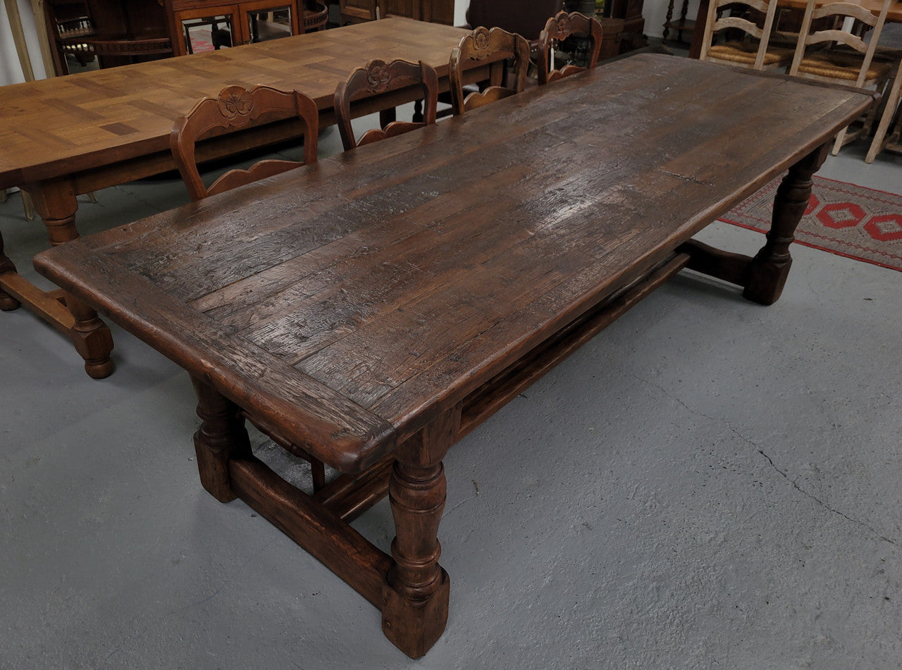 Amazing 2.65 meter French Elm Refectory dining table with loads of rustic charm. This table has been sourced from France and can comfortably seat ten people. It is in good original detailed condition.