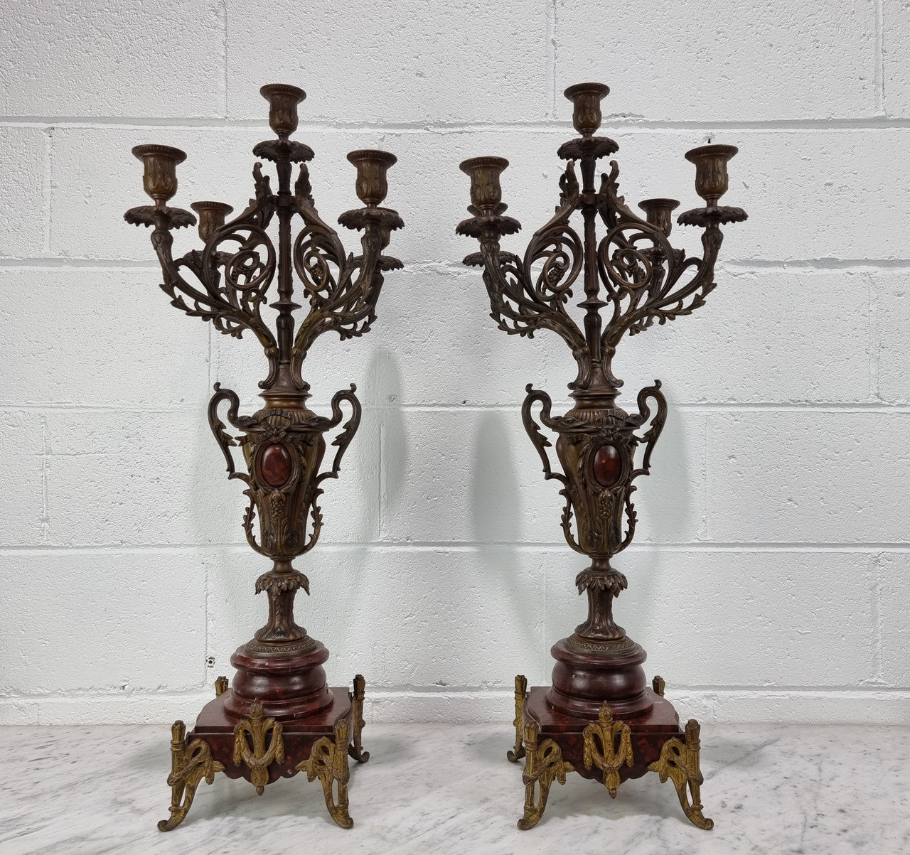 Pair of decorative Antique French spelter and marble candelabras. in very good original detailed condition.