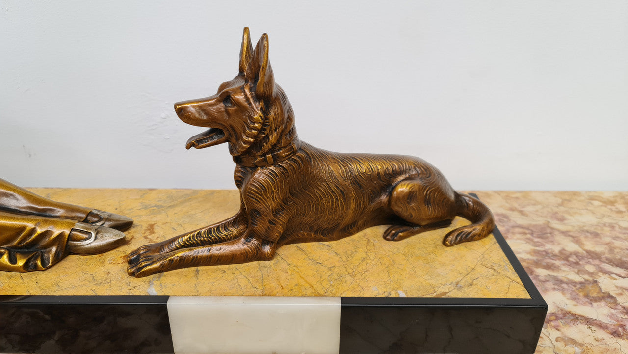 Art Deco sculpture of lovely seated lady with German Shepherd signed by signed by H.Molins. In good original detailed condition.