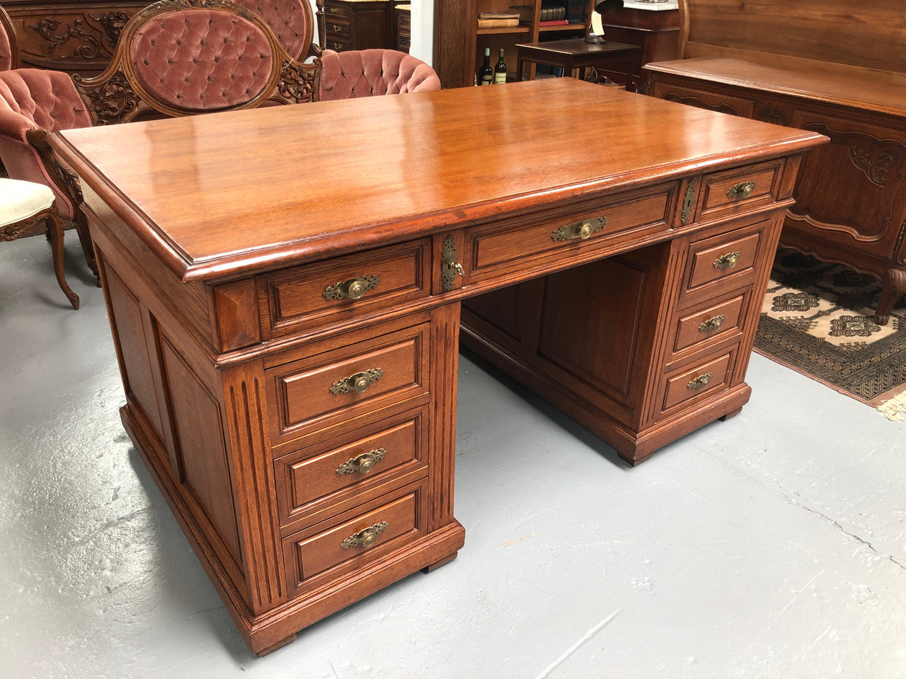 Antique french oak partners desk with plenty of drawers and cupboards and has an inbuilt Chubb Safe with keys. In very good condition.
