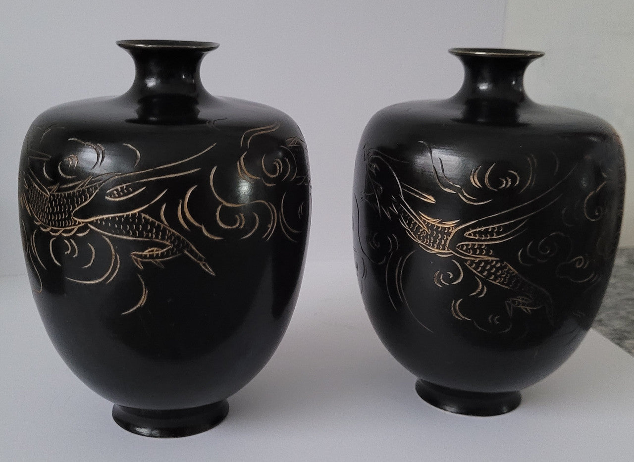 Pair of Antique Meiji Period Japanese etched Bronze vases. It is in good original condition, please view photos as they help form part of the description.