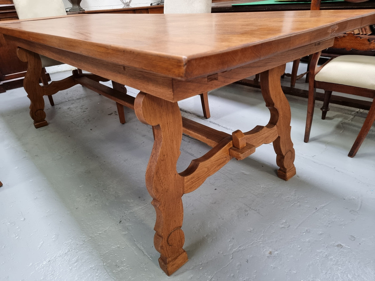 French light Oak Spanish style extension table. In good restored condition.