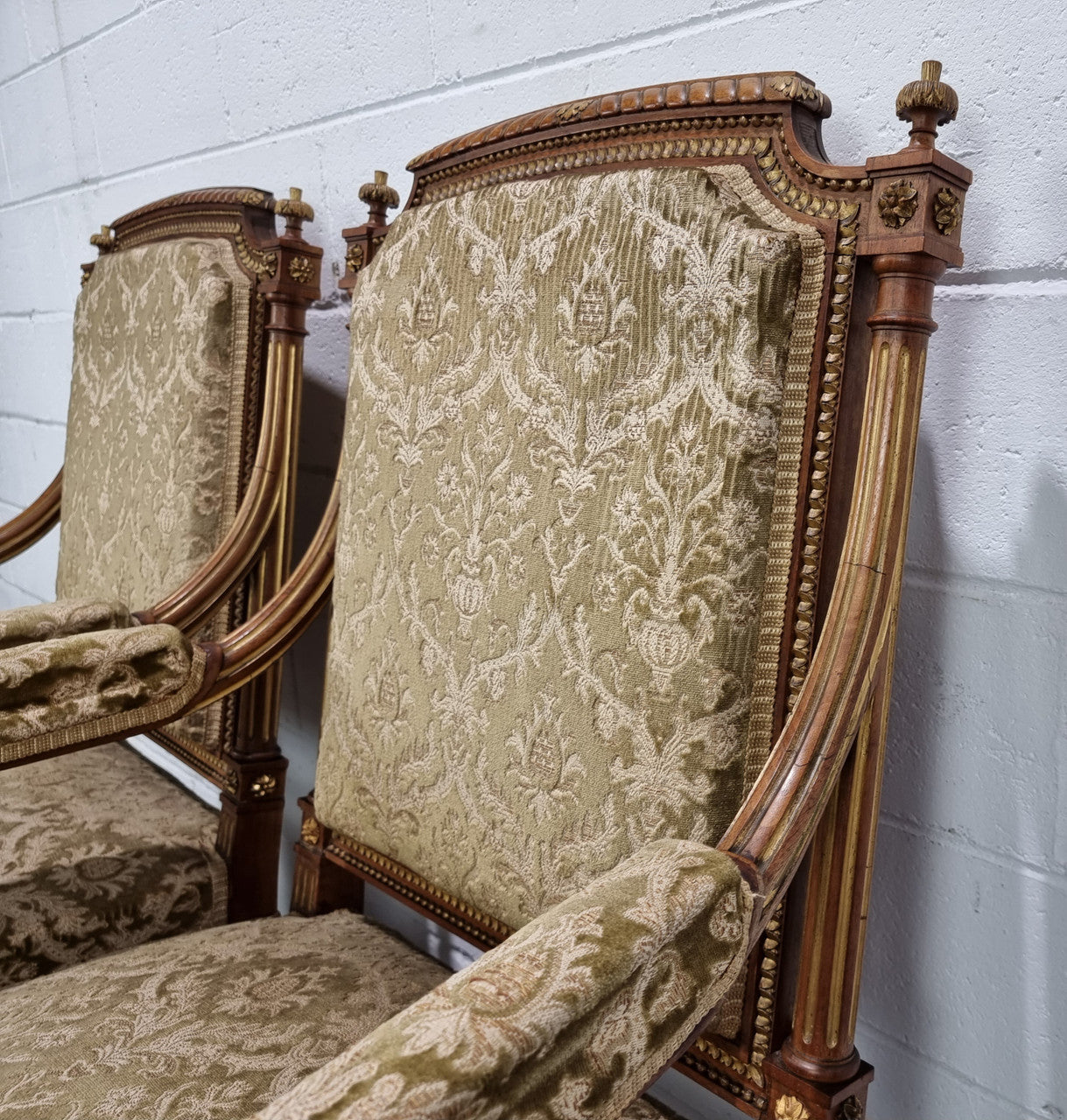 Beautiful French walnut Louis XVI style upholstered three piece Salon Suite. It has lovely fabric which is in overall good condition and is very comfortable to sit in. In good original detailed condition.