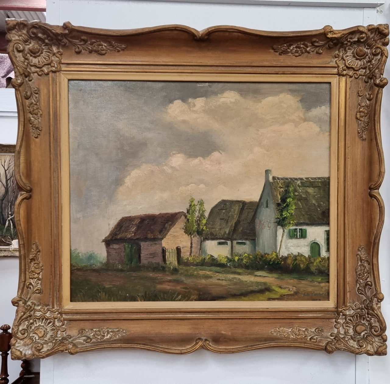 French signed oil on canvas depicting farmhouse in a lovely gilt frame. It is in good original detailed condition and has been sourced from France.