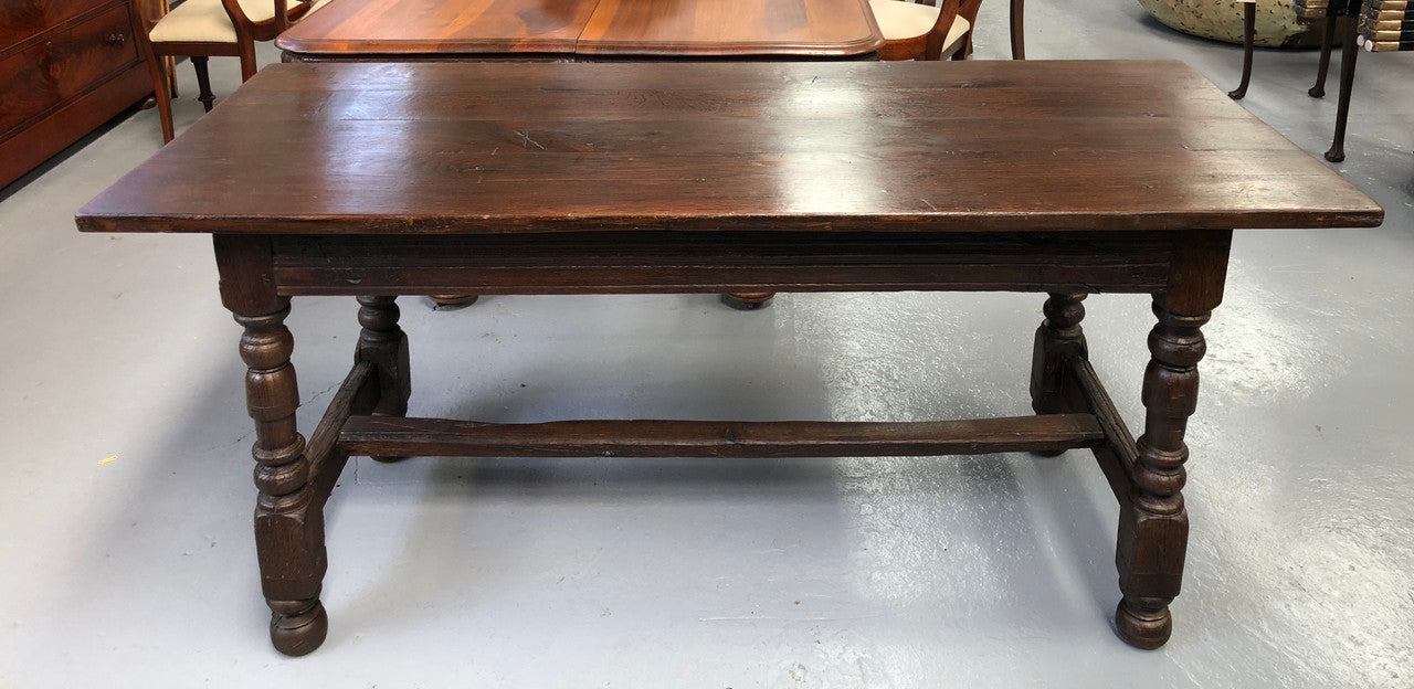 Early 19th Century French Oak petite size dining table. It seats six comfortably and would be ideal for an area with limited space. In very good original detailed condition.