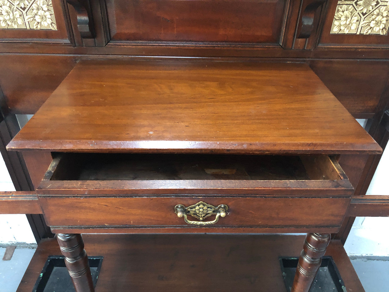 Late Victorian Hallstand with a mirror and drawer. In good original detailed condition.