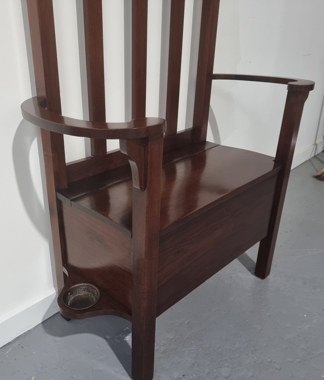 Blackwood Federation hall stand of pleasing narrow proportions. Beautiful round mirror with four lovely hooks and a lift up sit for added storage. In good original condition.