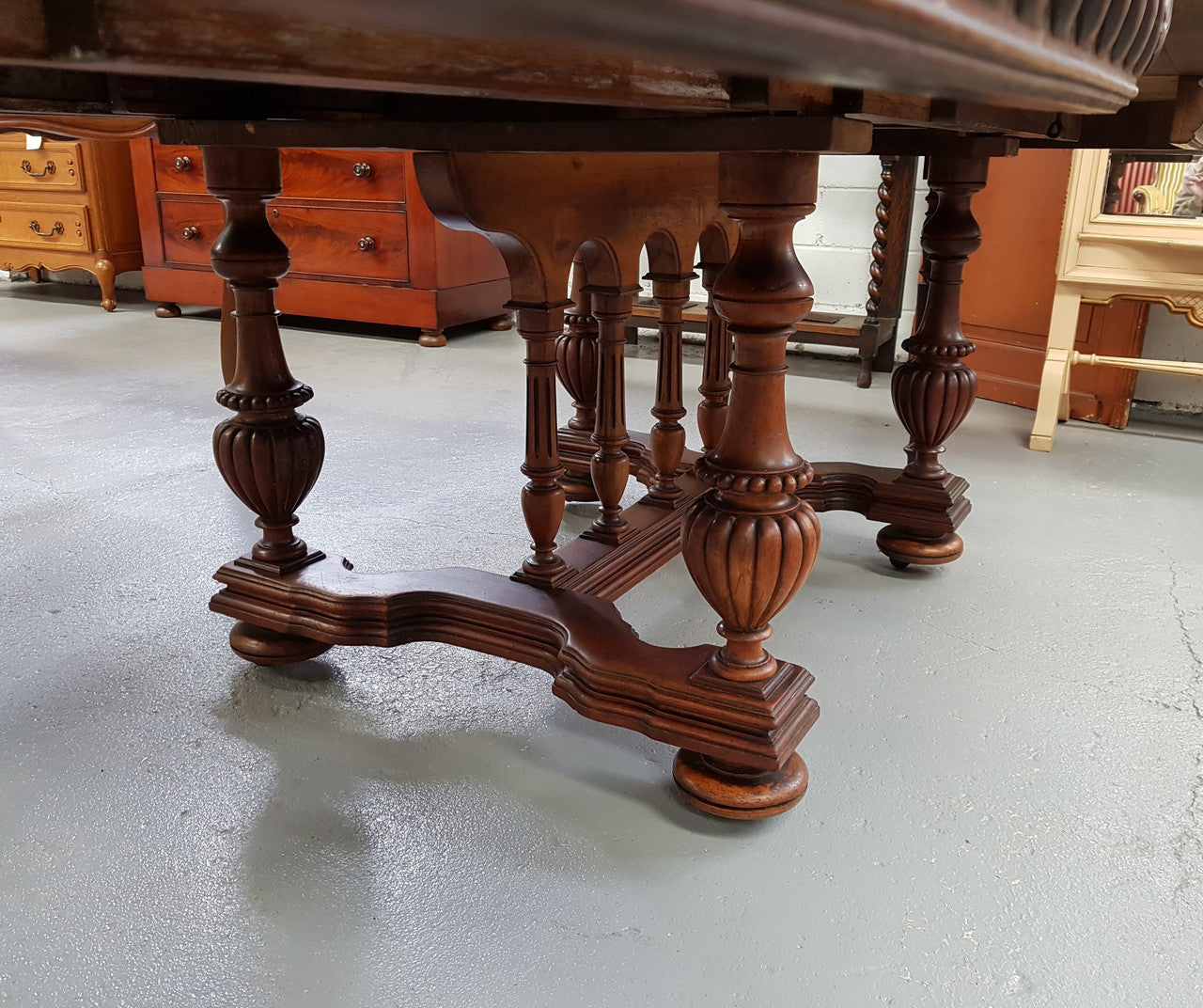 Henry II Style Walnut extension dining table. The table pulls out and it has two pine extension leaves that can be added to extend the table up to an extra 101 cm long. Tabletop and pine extension leaves are in good original condition with a wax finish.