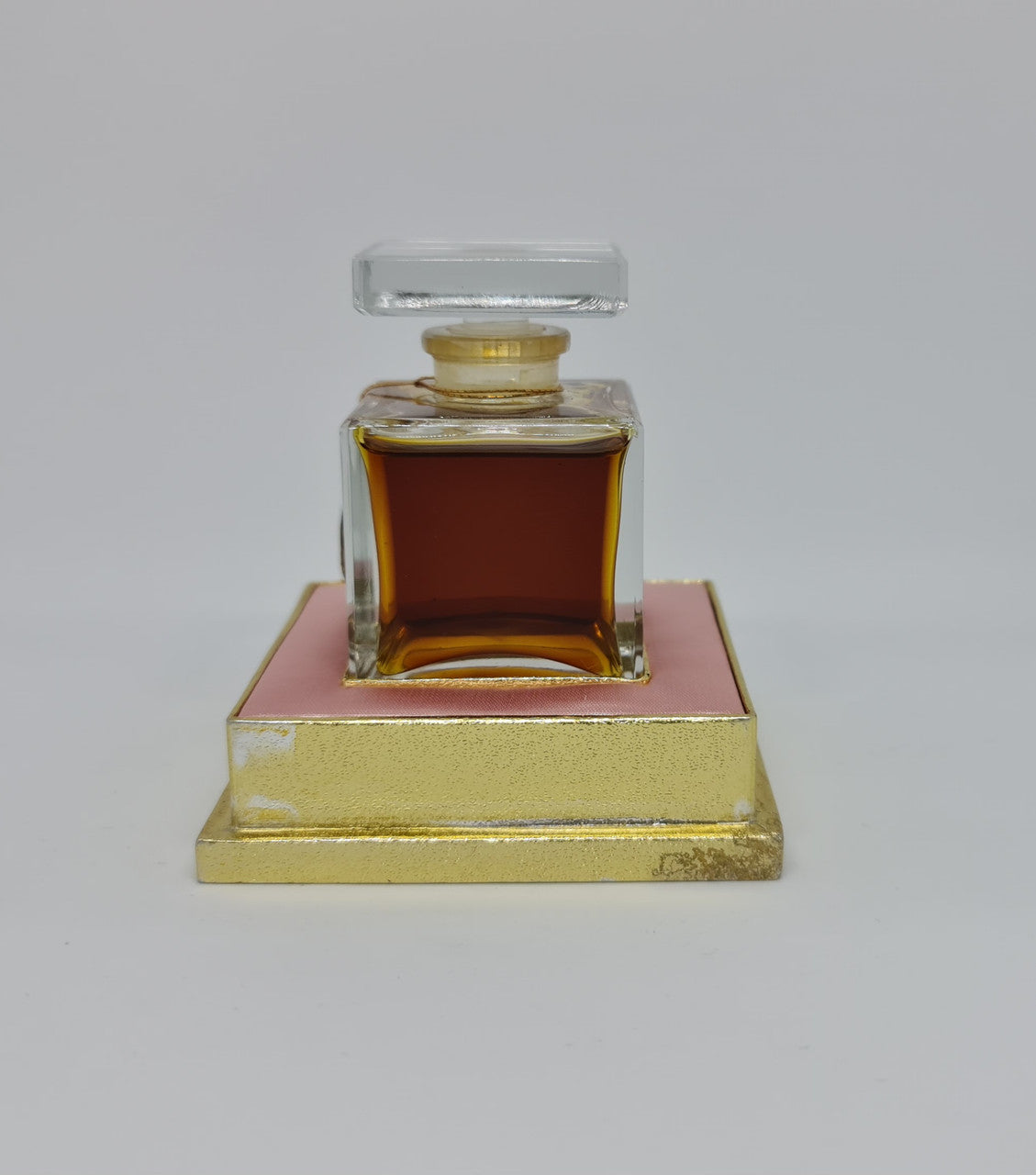 Beautiful Vintage snare "Mary Kay" French bottle of perfume. It is in amazing condition. Comes with pink and gold tray.
