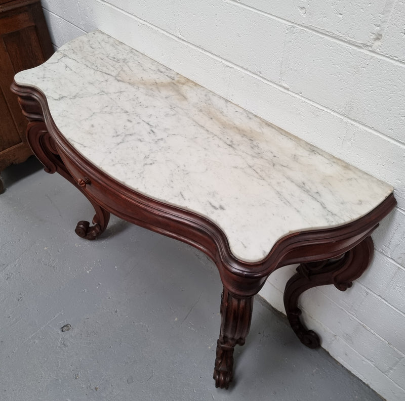 19th Century French Mahogany marble top console table. Louis XV style with white marble top and single drawer. Sourced from France and in good original detailed condition.