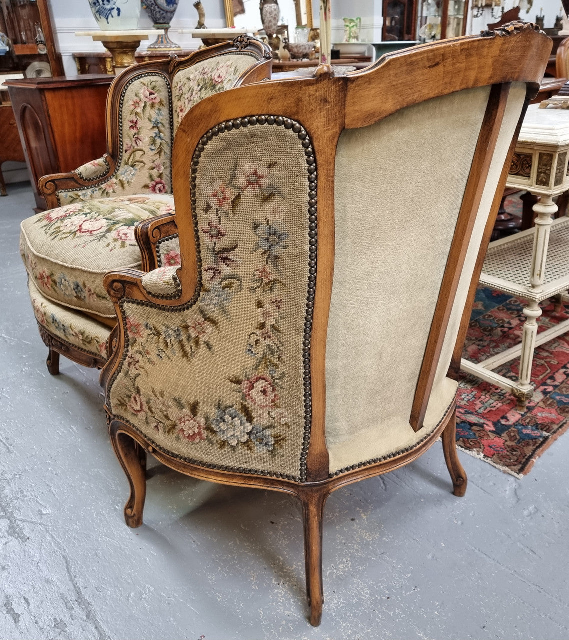 Pair of amazing French Walnut tapestry covered armchairs. The tapestry is in very good condition, please view photos as they form part of the description. Sourced from France and is in good original detailed condition.