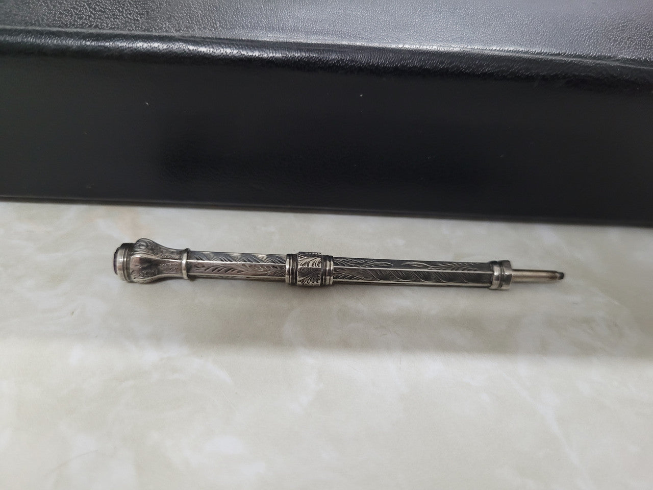 Interesting sterling silver and amethyst propelling and extending pencil. In good original condition, please view photos as they help form part of the description.