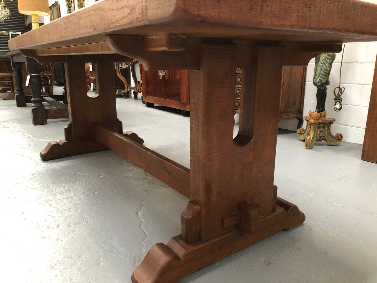 Lovely Oak French Farmhouse table with a thick plank top and lovely stretcher base. Can comfortable seat 8-10 people and is in good original detailed condition.