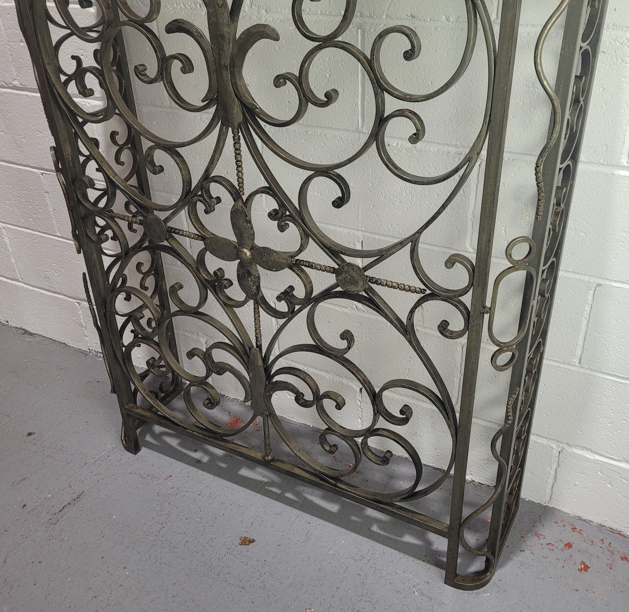 Stunning Art Deco wrought iron and marble top console table. It has amazing decorative iron work at the bottom and a beautiful marble top. It is in good original detailed condition.