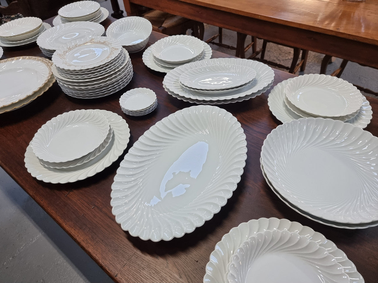 Limoge "Haviland" large white part dinner service. Includes some white service with gilt decoration. Although most items are in good condition please note two plates do have small chips. We are able to supply more photos on request.