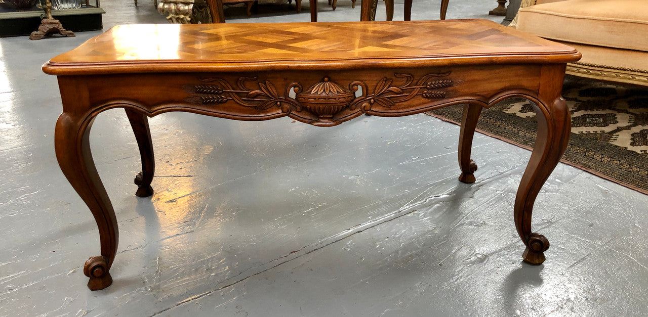 French Walnut parquetry top coffee table. In good original detailed condition. Circa: 1950's