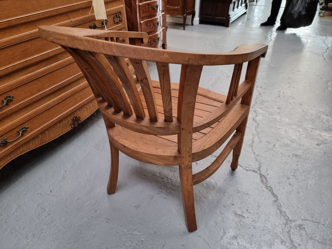 Vintage teak "Captains Chair". It is well built and very comfortable to sit in. It is in good original detailed condition.