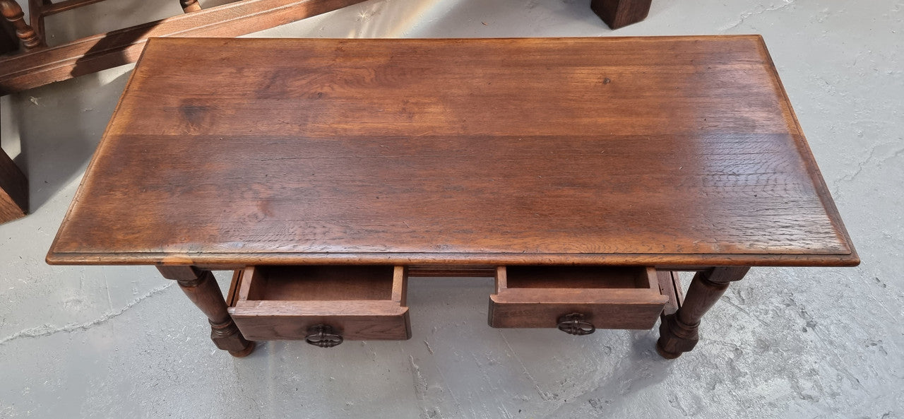 Beautiful French oak 2 drawer coffee table. In good original detailed condition.