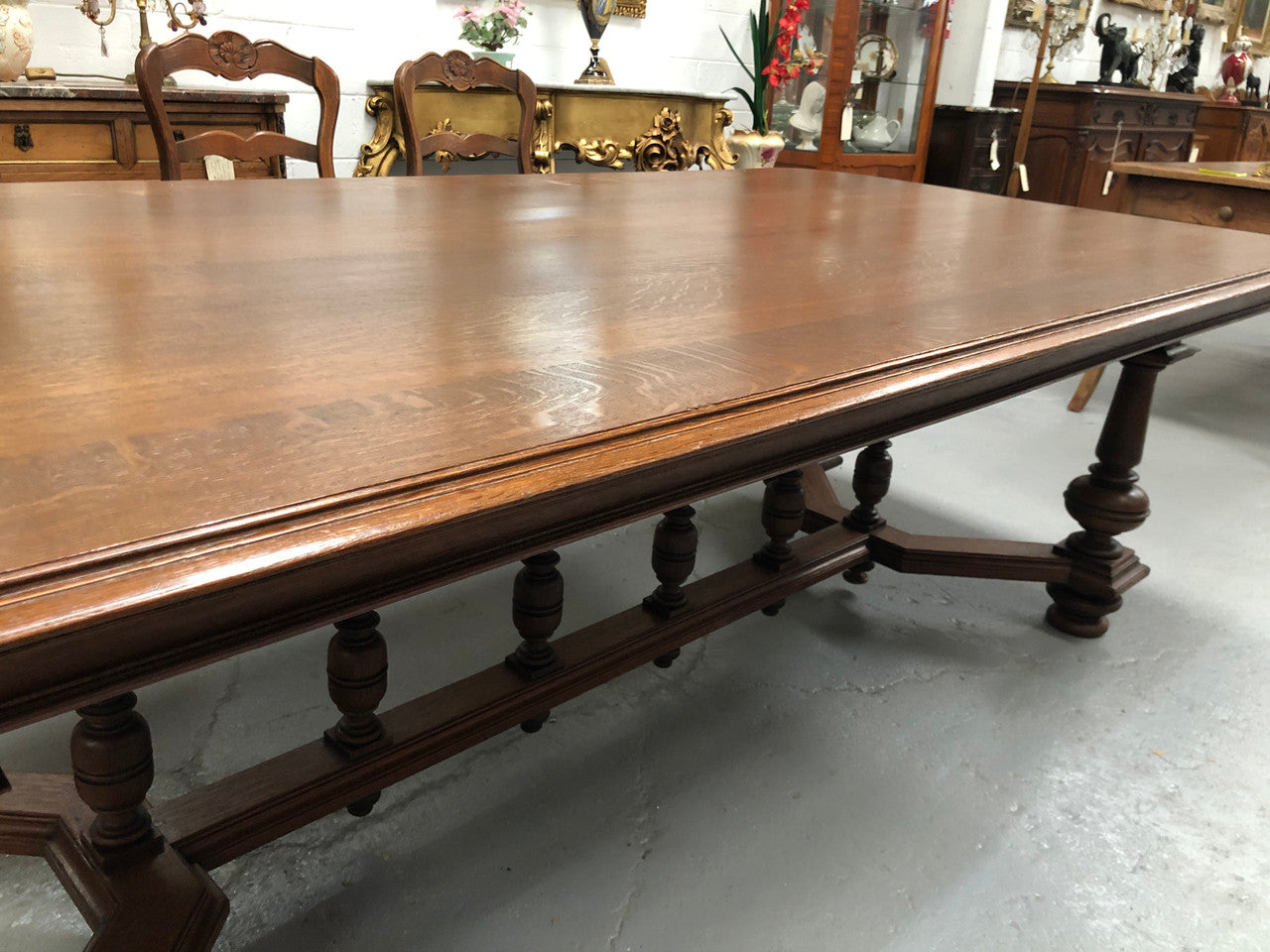 Large French Oak 19th century Henry II style dining table. It can seat 8 very comfortable and being very wide at 119 cm there is plenty of space to sit 10. In good original detailed condition.