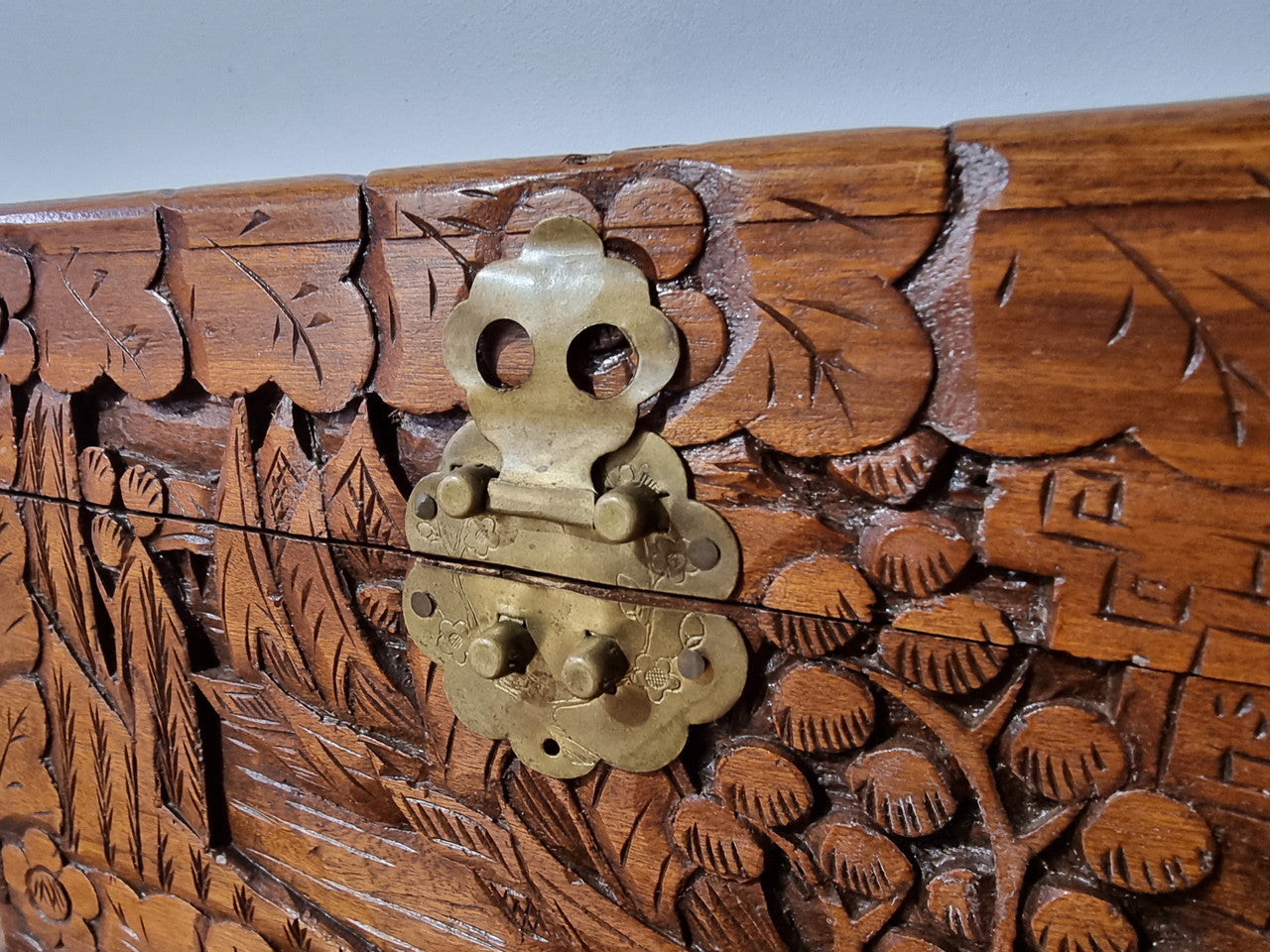 Small Chinese carved camphor wood jewellery box. It is in original condition.