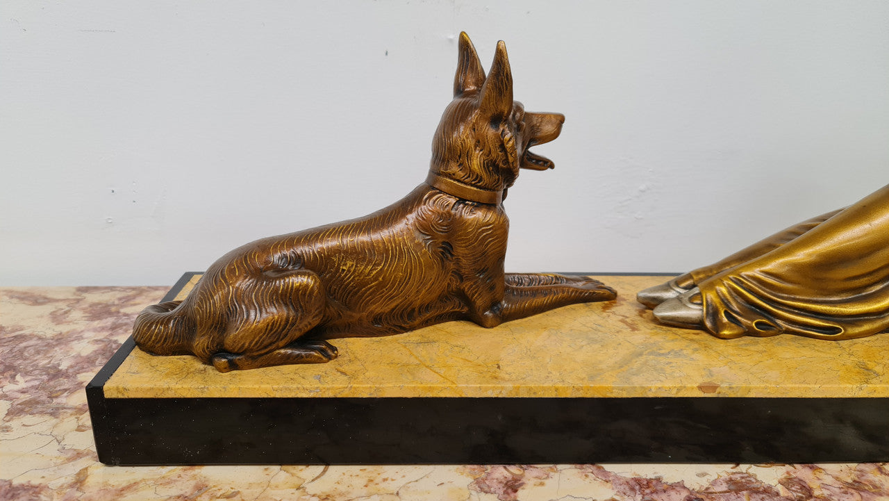 Art Deco sculpture of lovely seated lady with German Shepherd signed by signed by H.Molins. In good original detailed condition.