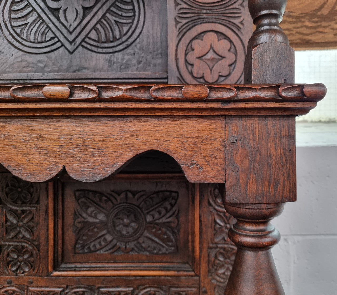 Impressively carved 18th Century English Oak kitchen dresser in 17th Century Jacobean style. It is in good original detailed condition and has been sourced from France.