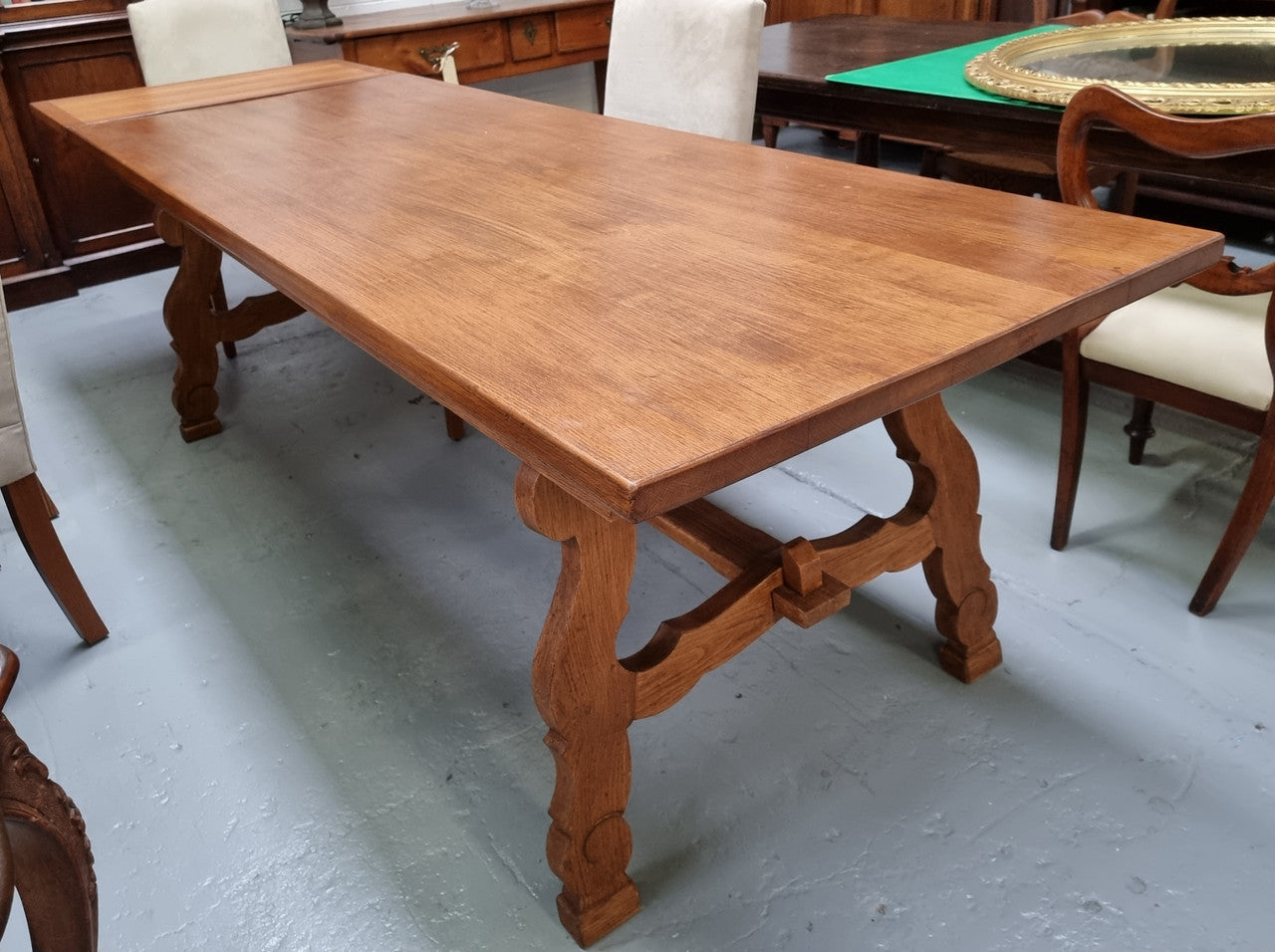 French light Oak Spanish style extension table. In good restored condition.