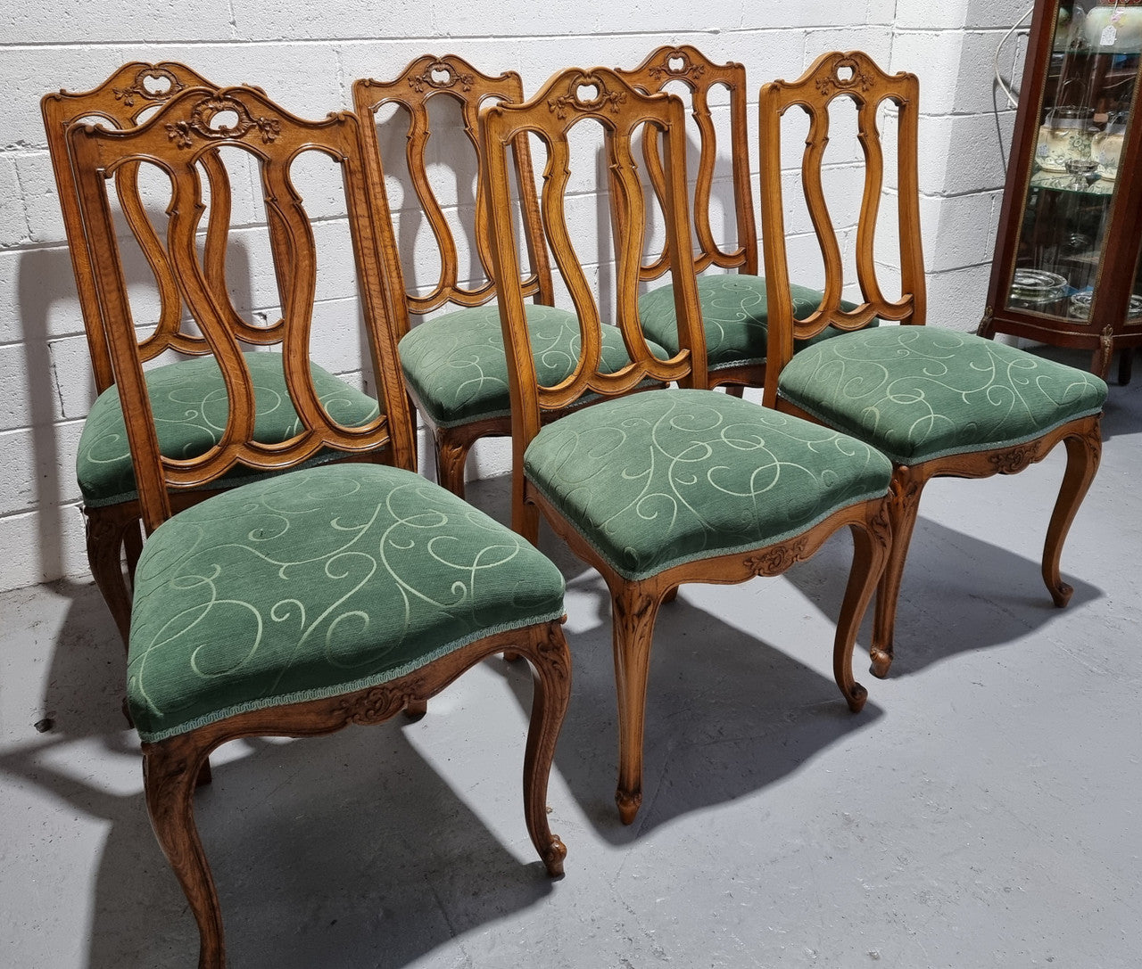 Set of six French style Oak decorative upholstered seat dining chairs. They are comfortable to sit in and are in good original condition, please view photos of fabric as the fabric is in good used condition.