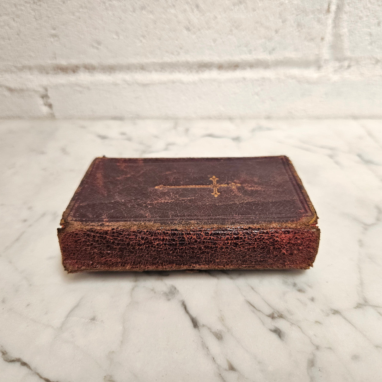 Very small antique leather bound Key of Heaven Manual of Prayer Book printed by M H Gill & Son Dublin. Condition commensurate with age.