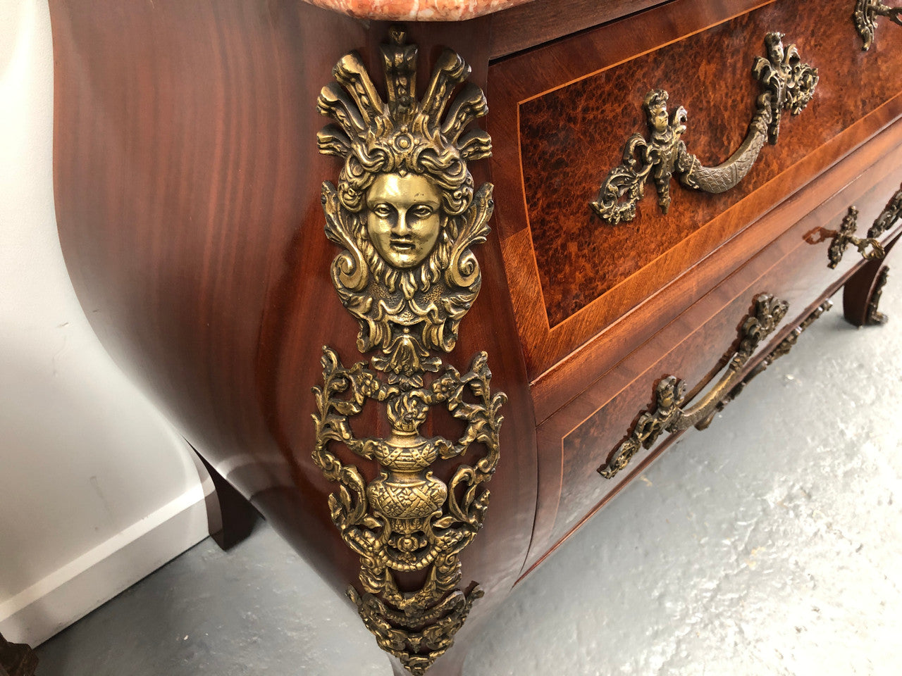 Grande French Louis XIV th style Amboyna and walnut two drawer marble top commode, with amazing detailed ormolu mounts, and sienna colour marble top. In good original detailed condition.