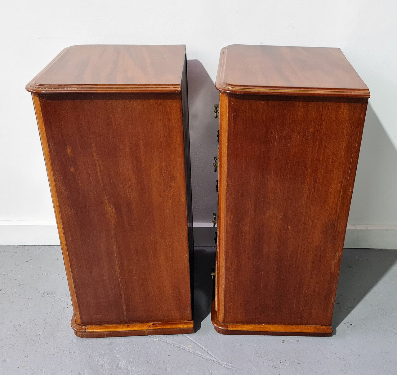 Pair of English Victorian Mahogany bedside drawers. In good original detailed condition.