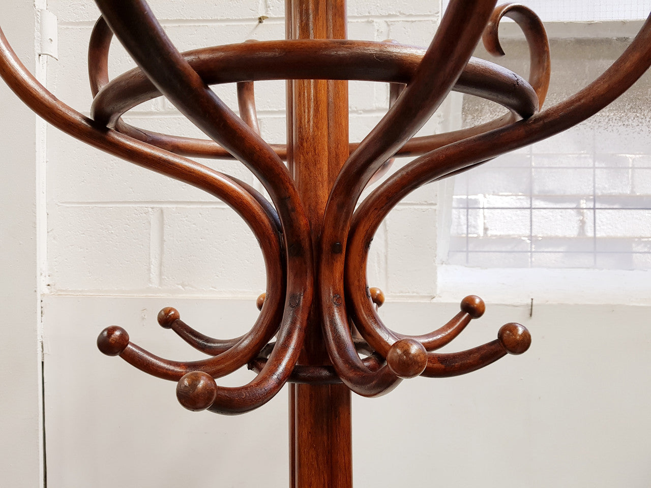 A great example of an Antique French walnut stained Thonet style hat and coat stand in very good restored condition. Very sturdy and solid. Hard to find. Circa 1900.