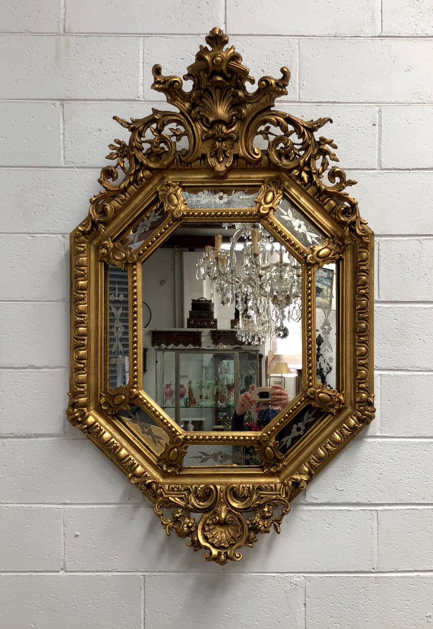 Early 19th Century gilt cushion mirror with acid etched floral pattern. In good condition. Please note original mirror does show some spotting commensurate with its age. Circa