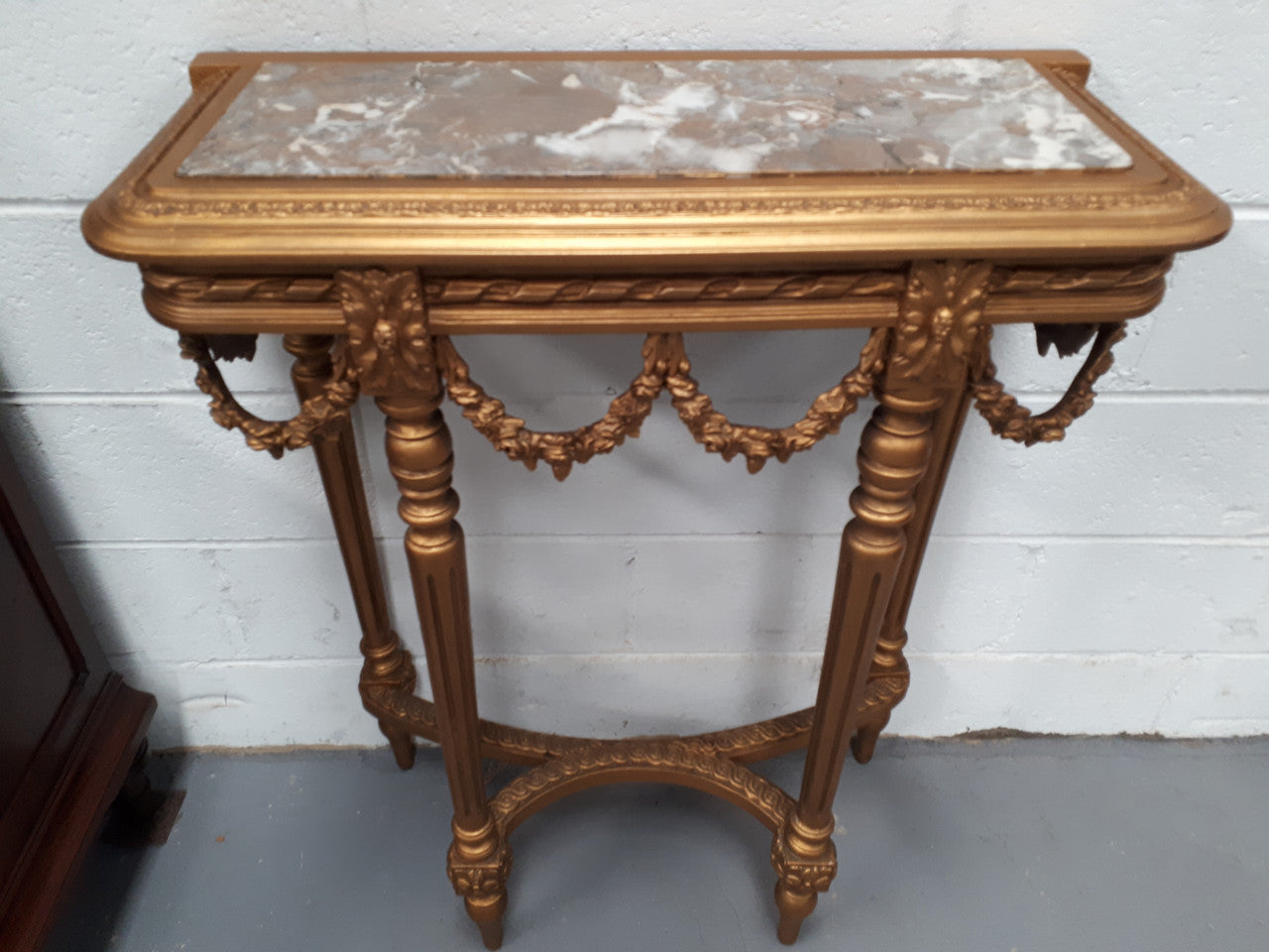 Antique French 19th century Louis XVI style inset marble top & giltwood console table. In good condition. Circa 1880