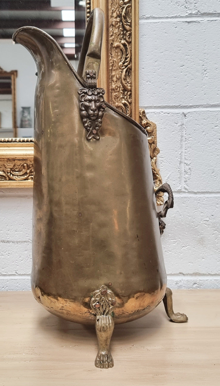 French brass coal bucket with Lion heads. In good original condition.