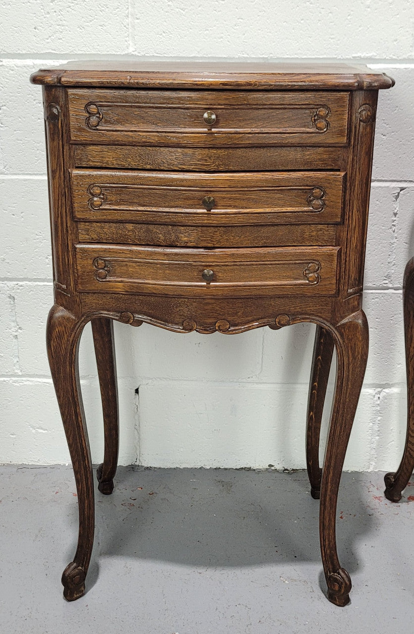 Lovely Louis XV style oak bedside cabinets with three drawers. In great original detailed condition.