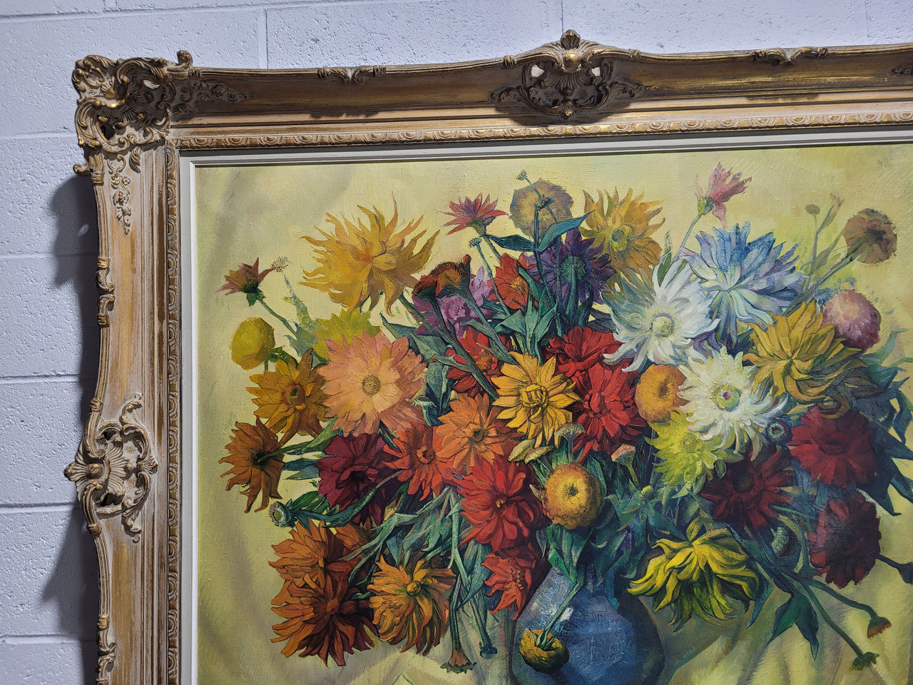 Large vibrant French oil on canvas of flowers and signed “Y.Fonteyn". In an amazing gilt frame and is in good original condition.