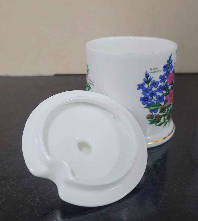 Fortnum & Mason Piccadilly London England floral decorated covered honey/jam pot. It is in good original condition with no chips or cracks, please view photos as they help form part of the description.