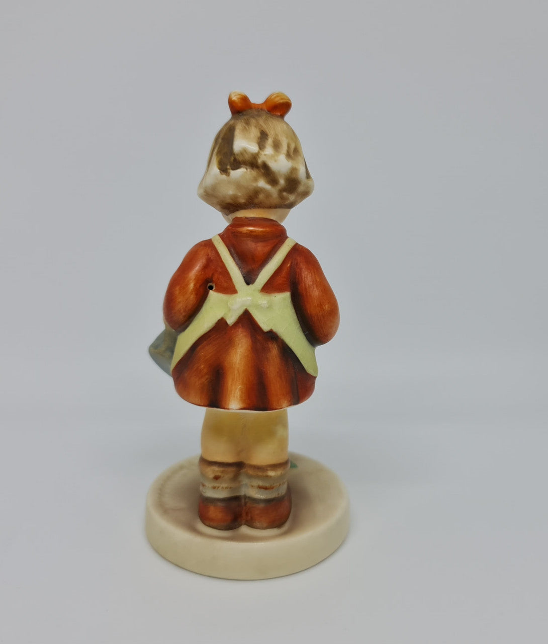 Gorgeous Hummel girl with watering can figurine, marked #74 . In great original condition.