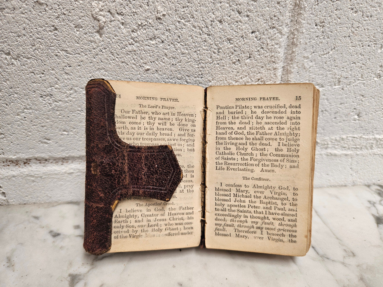 Very small antique leather bound Key of Heaven Manual of Prayer Book printed by M H Gill & Son Dublin. Condition commensurate with age.