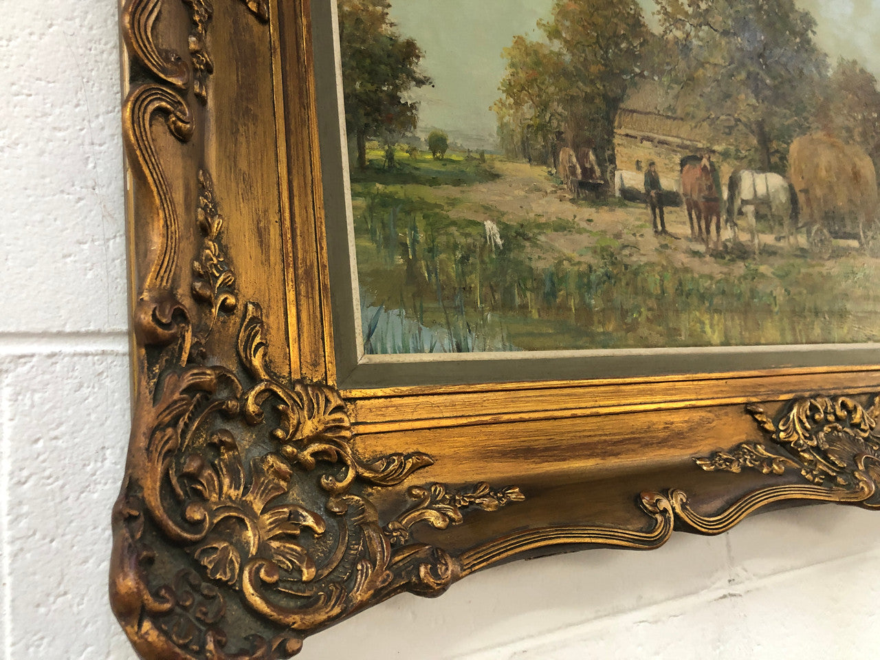 French oil on canvas of a beautiful farm scene in a lovely ornate frame, and in good original condition.