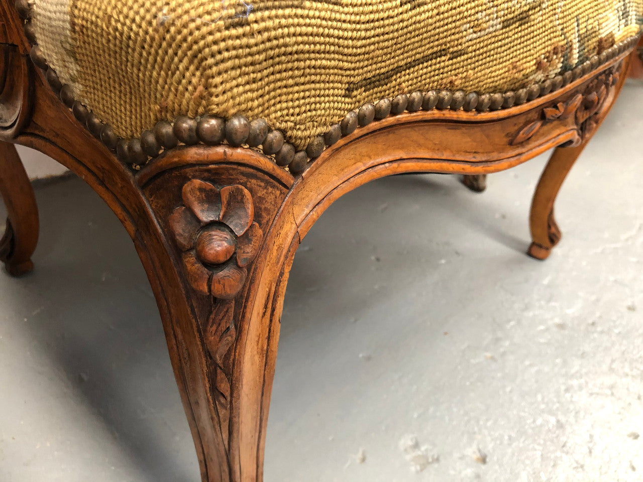 Pair of French Walnut Tapestry covered armchairs. They are in good original detailed condition. Slight wear and tear to fabric but still in good condition please view photos.