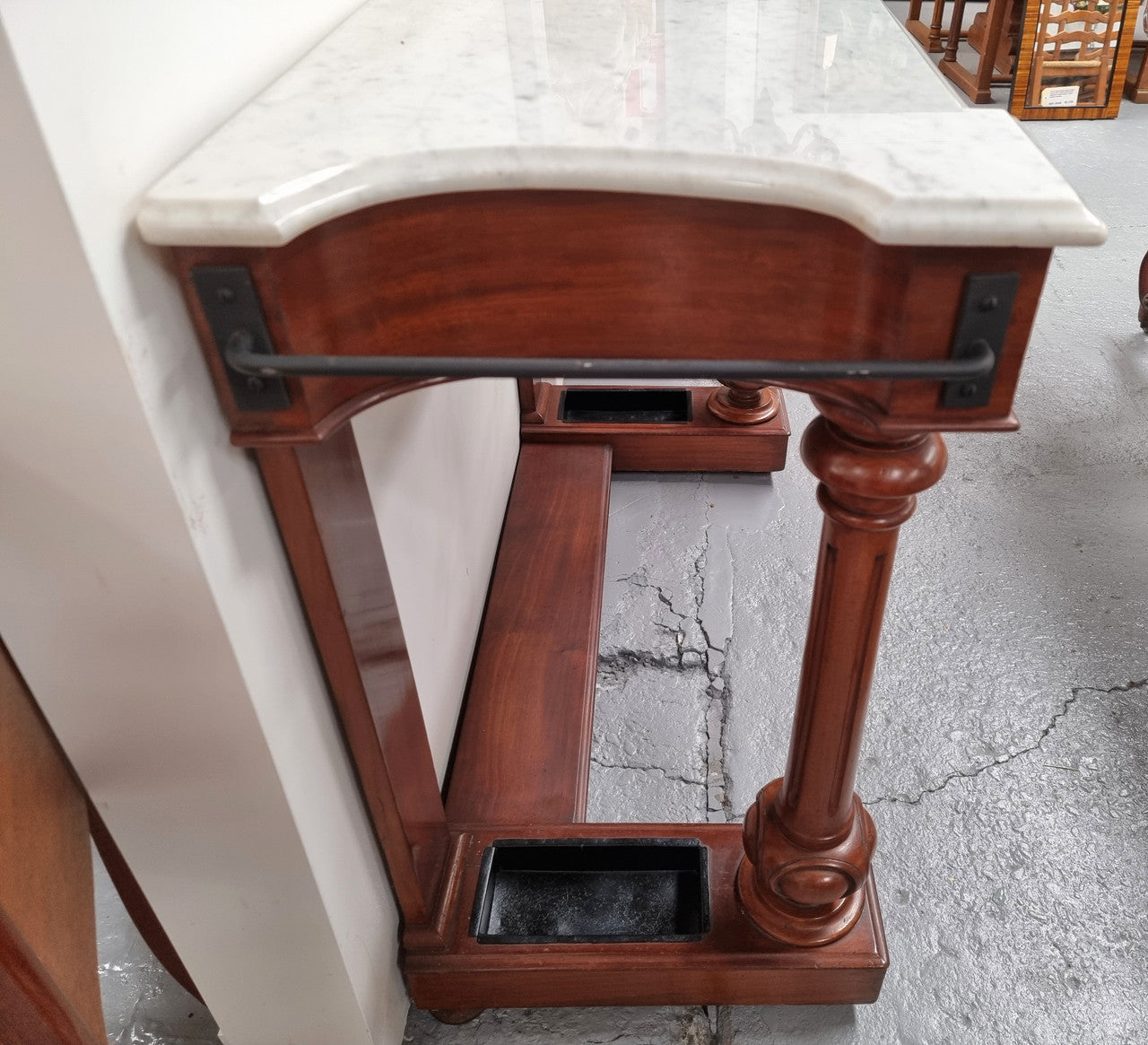Classic Victorian mahogany console table with white marble top, one drawer and accommodation for sticks/umbrellas. In good original detailed condition.