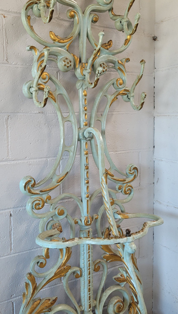 Very attractive 19th Century French cast iron painted and gilded hall stand with original small mirror. Sourced from France and in good original condition.