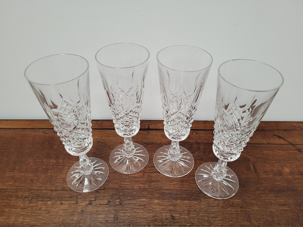 Set of four Waterford “Kenmare” pattern champagne flutes. In good original condition with no chips or cracks.