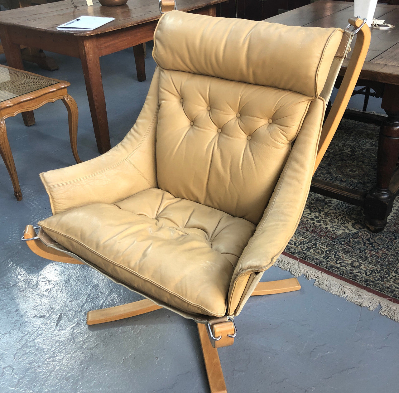 Fabulous Midcentury leather "Sigurd Ressell Falcon Chair" from Norway in good used condition with minor scratches to the leather consistent with age. Very sturdy and comfortable.