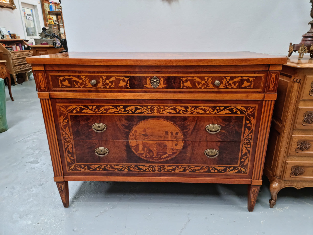 Neo Classical Style Italian superbly inlaid chest of drawers / Commode. In very good original detailed condition. Circa 1950's.